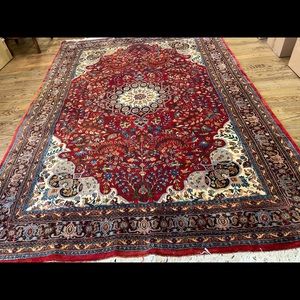 Hand made ,knotted , woven rug from India.